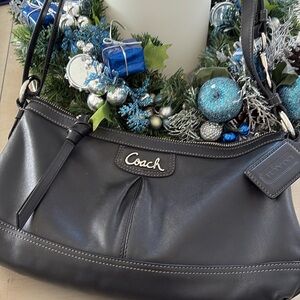 Timeless Coach Hobo Bag. Black, with adjustable length shoulder strap.
